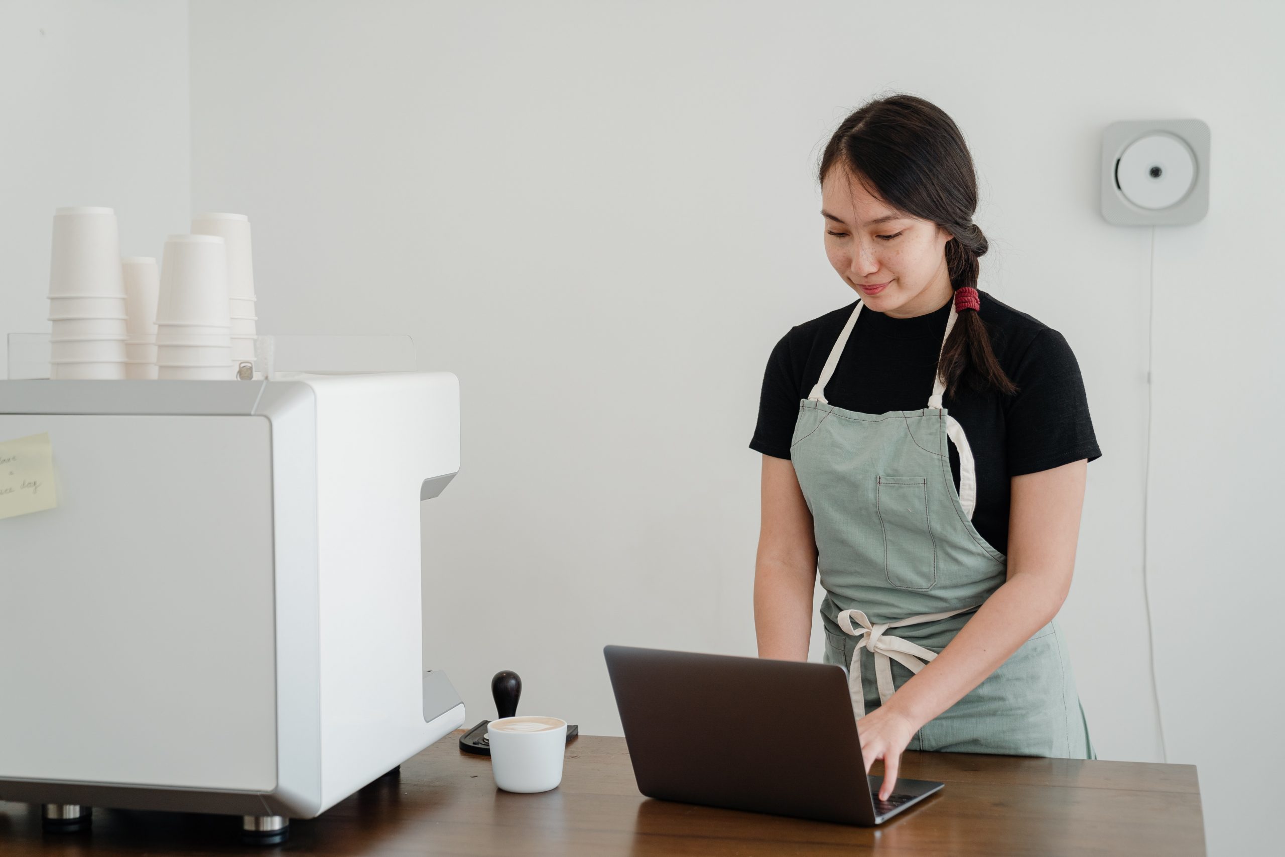 woman on computer at work home loan self-employed